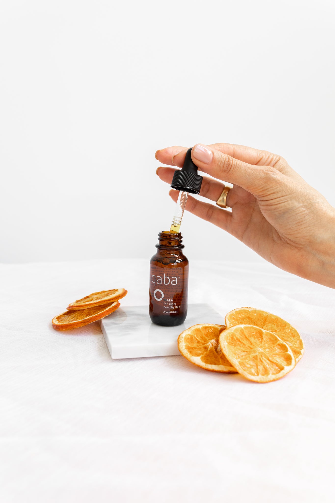 qaba Ibala Pure Orange Essential Oil for Hair – Refreshes and uplifts dark, copper, or red hair. Nourishes the scalp and stimulates hair growth and repair, absorbing into the bloodstream in just 3 seconds. Perfect for all hair types.